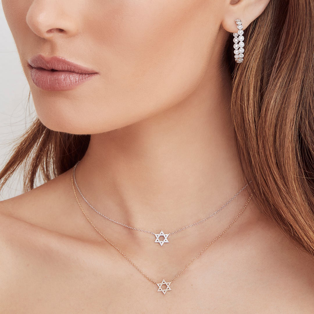 woman wearing diamond star of david jewelry